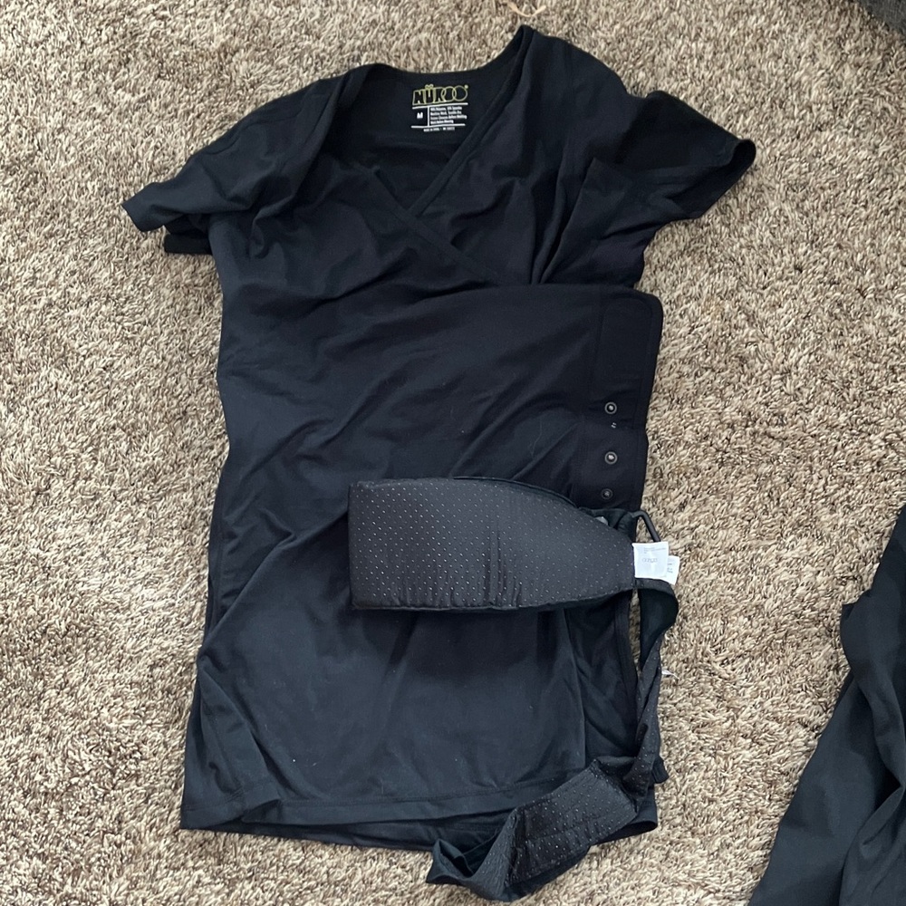 Nuroo baby wearing shirt